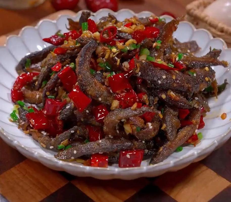 家常油炸泥鳅的做法视频-图1