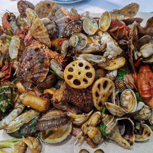 福州海鲜餐为何用手抓？-图1